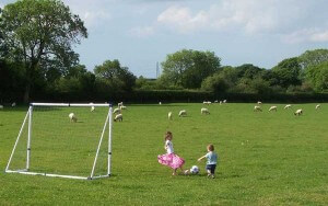 Your children can enjoy the freedom of playing in the meadow at our family friendly and romantic luxury self catering cottage in Cornwall